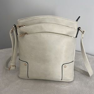 Crossbody tan purse
